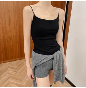 Black spaghetti strap camisole with grey knit shorts, comfortable and stylish outfit.