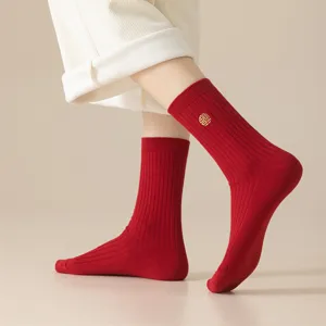 Comfortable pure red cotton mid-calf socks for women with ribbed knit and embroidery.