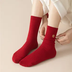 Classic red ribbed cotton socks for women, featuring a delicate golden embroidered detail and cozy fit.