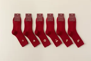 Red cotton socks set with gold embroidery details, ideal for winter and festive wear.