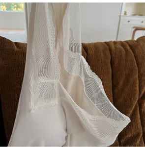 Close-up detail of women thermal top featuring delicate lace V-neck trim and built-in cup design.