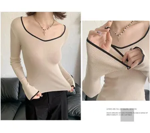 Close-up details of the versatile two-way wear knit top featuring elegant contrast black trim.