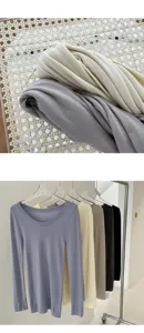Camiseta térmica mujer manga larga cuello redondo vista detalle tejido punto suave varios colores.