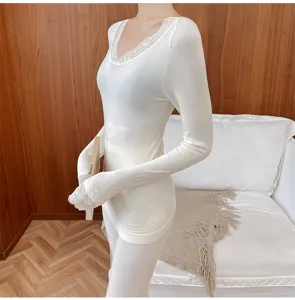 Detailed view of women winter seamless lace thermal underwear set long sleeve top white