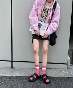 Women's striped mid-tube socks, comfortable cotton blend daily wear, pink fashion model detail.
