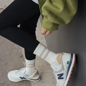 Detailed view of women autumn winter striped mid-tube socks comfort cotton hosiery daily wear