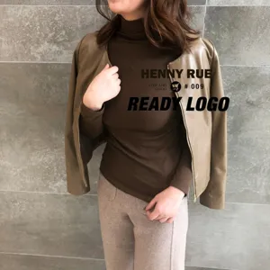 Women brown turtleneck ribbed thermal top with stylish brown leather jacket for autumn fashion.