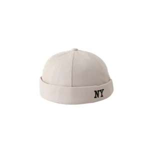 Casquette docker en toile beige avec broderie NY noire, bonnet d'inspiration urbaine chic.