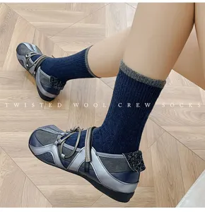 Women's autumn winter wool blend crew socks with color-block ribbed knit texture and comfortable fit.