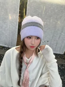 Cozy women's knit beanie hat in light purple and grey stripes, thick warm winter headwear