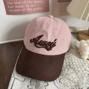 Casual pink brown baseball cap with embroidered letter, wide brim sun protection hat.
