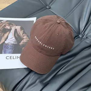 Brown cotton baseball cap with embroidered Brooklyn 1985 letter, stylish sun-shading casual hat.