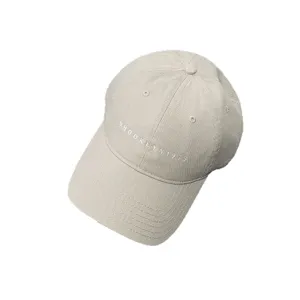 Beige embroidered baseball cap for women, stylish sun hat with Brooklyn 1985 letter design.