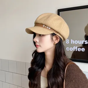 Stylish wool blend newsboy cap for women, classic octagonal hat with letter strap decor.