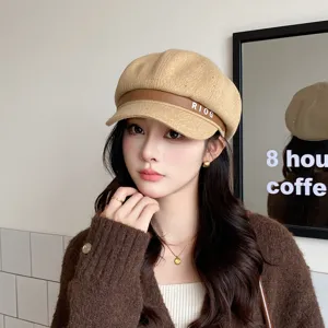 Chic women's newsboy cap khaki wool octagonal hat with trendy letter strap design.