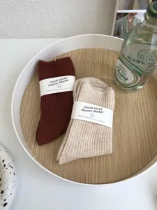 Fall winter minimalist solid color mid-tube cotton socks set with elegant brown and beige.