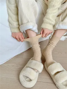 Cozy thermal mid-calf socks for women, featuring cable knit texture and warm autumn shade.