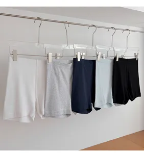 Comfortable cotton four-quarter safety shorts in multiple colors, hanging neatly for daily wear.