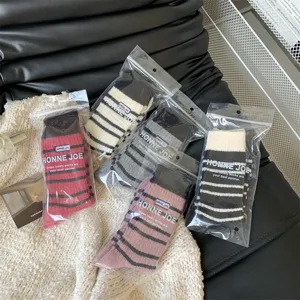 Thickened striped wool-blend women warm mid-tube slouch socks for autumn and winter daily wear.