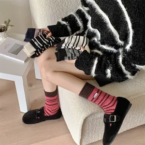Cozy autumn winter striped thick warm mid-calf women socks with soft wool-like knit design.