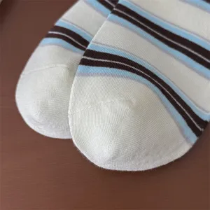 Detail view of women's vintage striped mid-tube cotton socks, showing fine toe knitting texture.