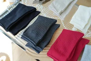 Detailed view of Japanese style ribbed cotton mid-tube women socks in assorted colors.