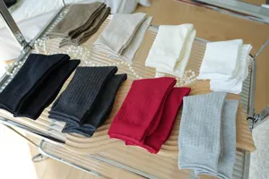 Detailed shot of Japanese style ribbed mid-tube cotton socks in versatile Maillard colors.