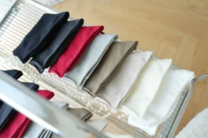Details of womens cotton mid tube stacking socks in various colors like black white and red.
