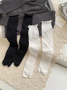 Comfortable women's tabi split-toe mid-calf socks in black and white basic casual styles.