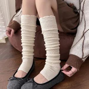 Cream white knitted wool leg warmers, slouchy stirrup socks with elegant diamond patterns.
