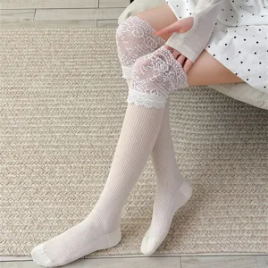 Detailed view of sweet lace top ribbed over-the-knee socks showing fine fabric texture.