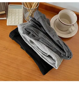 Cotton ribbed stirrup leggings for women, solid color casual tight socks detail view.