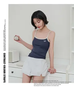 Zero-carbon modal camisole top with contrast straps and delicate tennis racket embroidery.