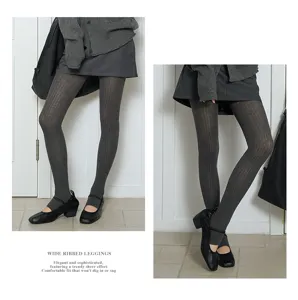 Wide ribbed stirrup leggings for women, solid dark grey cotton footed tights for spring.