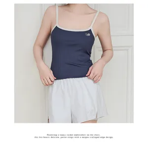 Women ribbed modal camisole top with cute tennis embroidery and contrast scalloped straps.