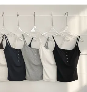 Detailed view of ribbed camisole with lace trim, built-in chest pads and front buttons.