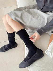 Women black stack socks detail shot, soft breathable cotton calf socks for spring summer.
