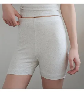 Ribbed cotton safety shorts detail shot, high waist loungewear comfortable fit for summer.