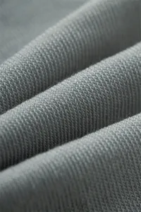 Gros plan sur le tissu avec une texture tricotée fine et respirante pour chaussettes.