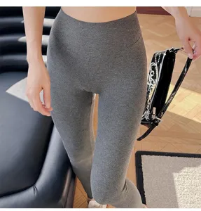 Ribbed seamless high waist yoga pants, close-up view of dark grey elastic leggings for workout.