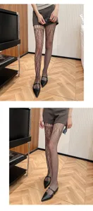 Detail view of women summer lace fishnet pantyhose, asymmetrical pattern, breathable sheer tights.