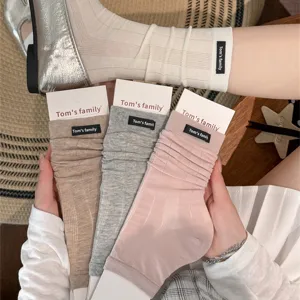 Women's cute ballet style ribbed leg warmers summer thin stack socks with fabric brand label.