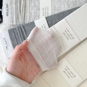 Detailed view of women hollow modal socks with delicate lace trim for breathable spring wear.