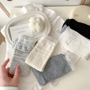 Women lace trim hollow cotton mid-tube slouch socks detail view spring fashion socks