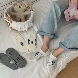 Detailed view of cute bear embroidered women low cut boat socks with sweet striped design for spring.