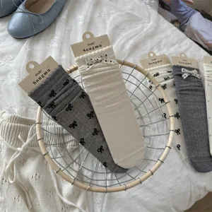 Calcetines medios transpirantes de mujer con lindo lazo primavera verano estilo dulce