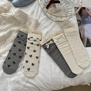 Calcetines finos estilo coreano con lazo lindo ins dulce gris blanco apilados