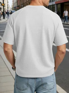 Men's waffle knit textured short sleeve t-shirt detail view showing premium fabric quality.