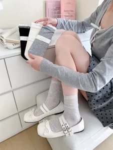 Women's hollow cotton solid color lace trim mid-tube socks spring new design detail view