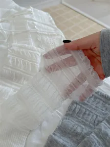Detail shot of women summer mesh ballet style stirrup leg warmers, breathable slouch socks.